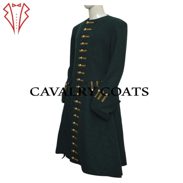 A man wearing a long green frock coat with a military-style design, featuring ornate buttons and structured tailoring.