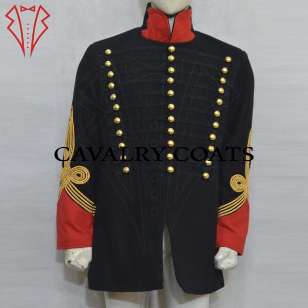 Black Dolman Husaren Jacket. This historical military garment features a high collar, adorned with gold braiding and intricate embroidery. The front of the jacket displays a series of parallel gold cords, known as frogging, fastened with decorative buttons. The cuffs and sleeves are similarly embellished with gold accents. The rich black fabric contrasts elegantly with the bright gold decorations, reflecting the ceremonial and formal nature of this uniform piece